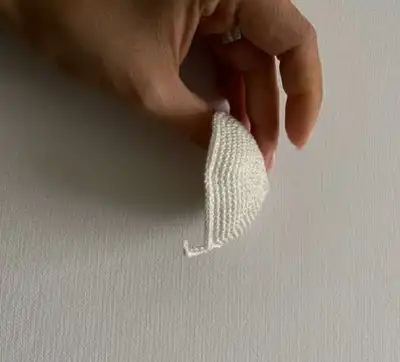Cruella Doll Amigurumi Pattern step 4 - final assembly and finishing
