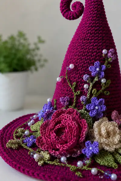 Big Tall Magenta Spiral Witch Hat with Wildflowers and Pearls Pattern step 2 - assembly progress