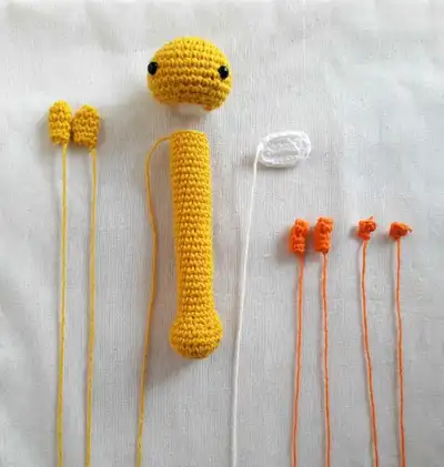 Baby Rattle Amigurumi Pattern step 3 - details and accessories