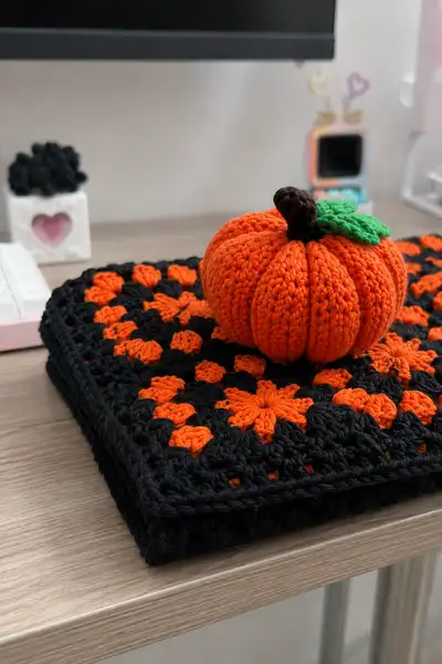 Black and Orange Granny Square Row Table Runner with Pumpkins Pattern step 2 - assembly progress