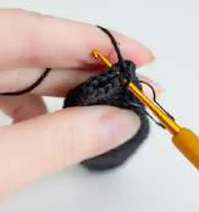 Penguin Amigurumi Pattern step 4 - final assembly and finishing