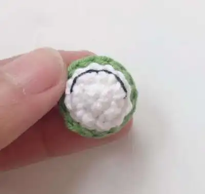 Frog Phone Pouch Amigurumi Pattern step 4 - final assembly and finishing