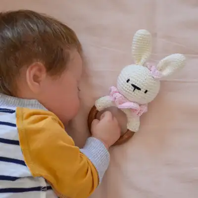 Bunny baby rattle with teether ring Amigurumi Pattern step 4 - final assembly and finishing
