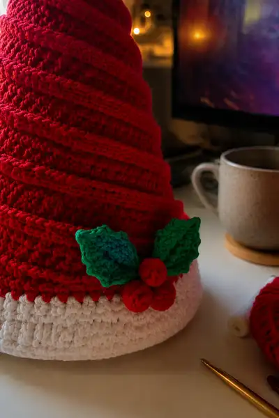 Big Red Spiral Santa Hat with White Pom Pom and Holly Amigurumi Pattern step 2 - assembly progress