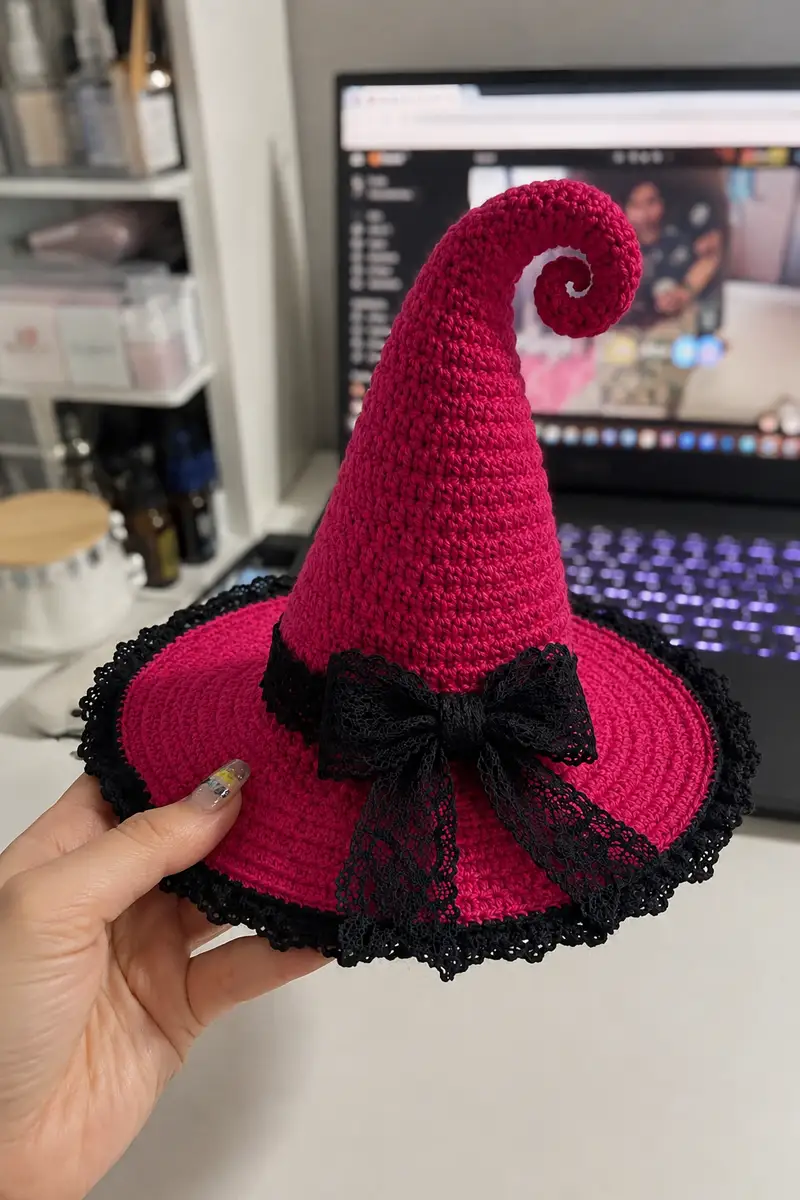 Big Hot Pink Spiral Witch Hat with Black Lace Trim and Bow Pattern crochet pattern - detailed view of completed project