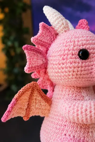 Big Cupid Dragon with Tiny Wings and a Heart Arrow Amigurumi Pattern step 2 - assembly progress