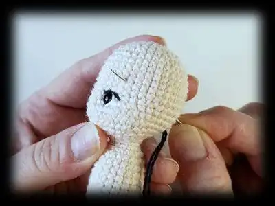 Mini Baby Doll Amigurumi Pattern step 3 - details and accessories