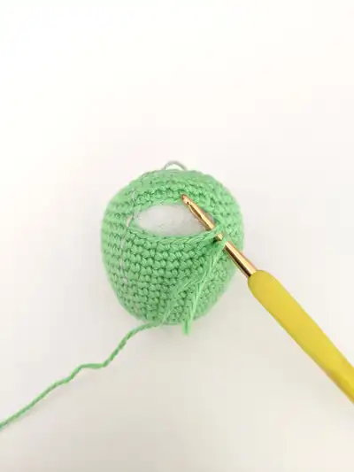 Colourful Mini Dino Amigurumi Pattern step 2 - assembly progress