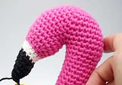 Florence the Flamingo Amigurumi Pattern step 4 - final assembly and finishing