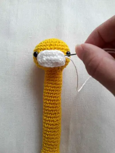 Baby Rattle Amigurumi Pattern step 4 - final assembly and finishing