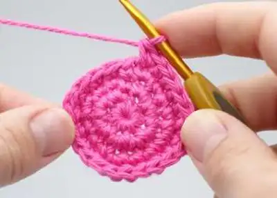 Florence the Flamingo Amigurumi Pattern step 2 - assembly progress