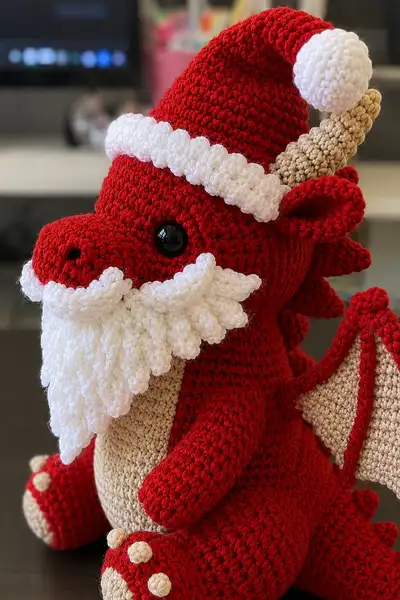 Santa Dragon with Red Hat and Fluffy White Beard Amigurumi Pattern step 2 - assembly progress