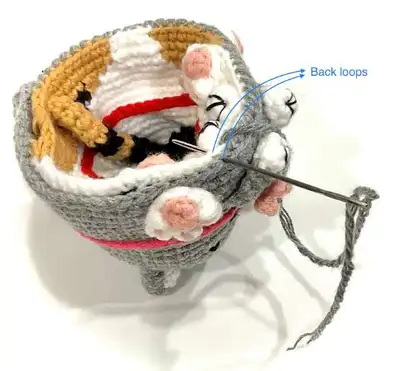 Reversible Cat Amigurumi Pattern step 4 - final assembly and finishing