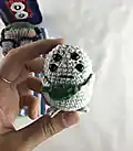 Groot with Headphones and Audio Player Amigurumi Pattern step 4 - final assembly and finishing