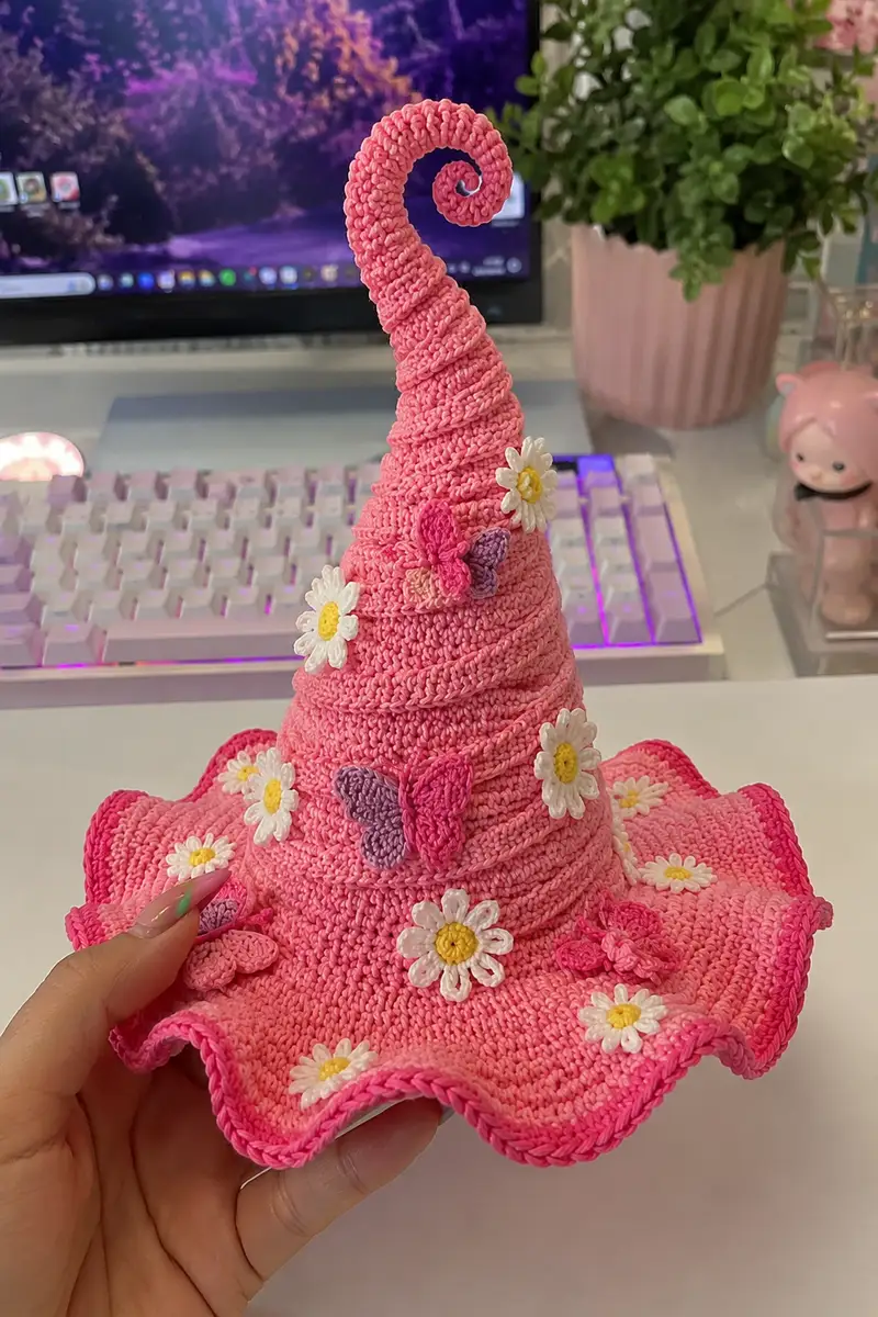 Big Tall Bubblegum Pink Spiral Witch Hat with Daisies and Butterflies Pattern crochet pattern - detailed view of completed project