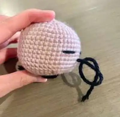 Sleeping Pink Puff (Sleeping Kirby) Amigurumi Pattern step 4 - final assembly and finishing