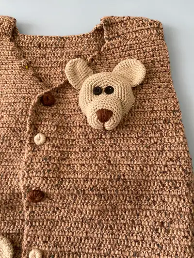 Bear Applique Baby Vest Crochet Pattern step 2 - assembly progress