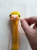 Baby Rattle Amigurumi Pattern step 4 - final assembly and finishing