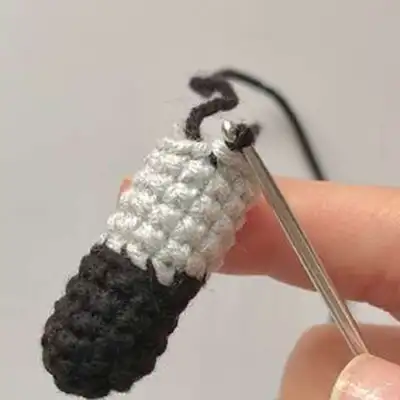 Batman Amigurumi Pattern step 4 - final assembly and finishing