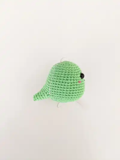 Colourful Mini Dino Amigurumi Pattern step 4 - final assembly and finishing