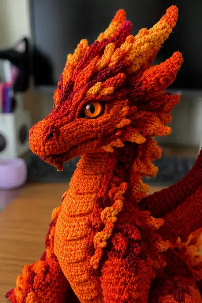 Big Fiery Orange Lava Dragon with Amber Eyes Amigurumi Pattern step 2 - assembly progress