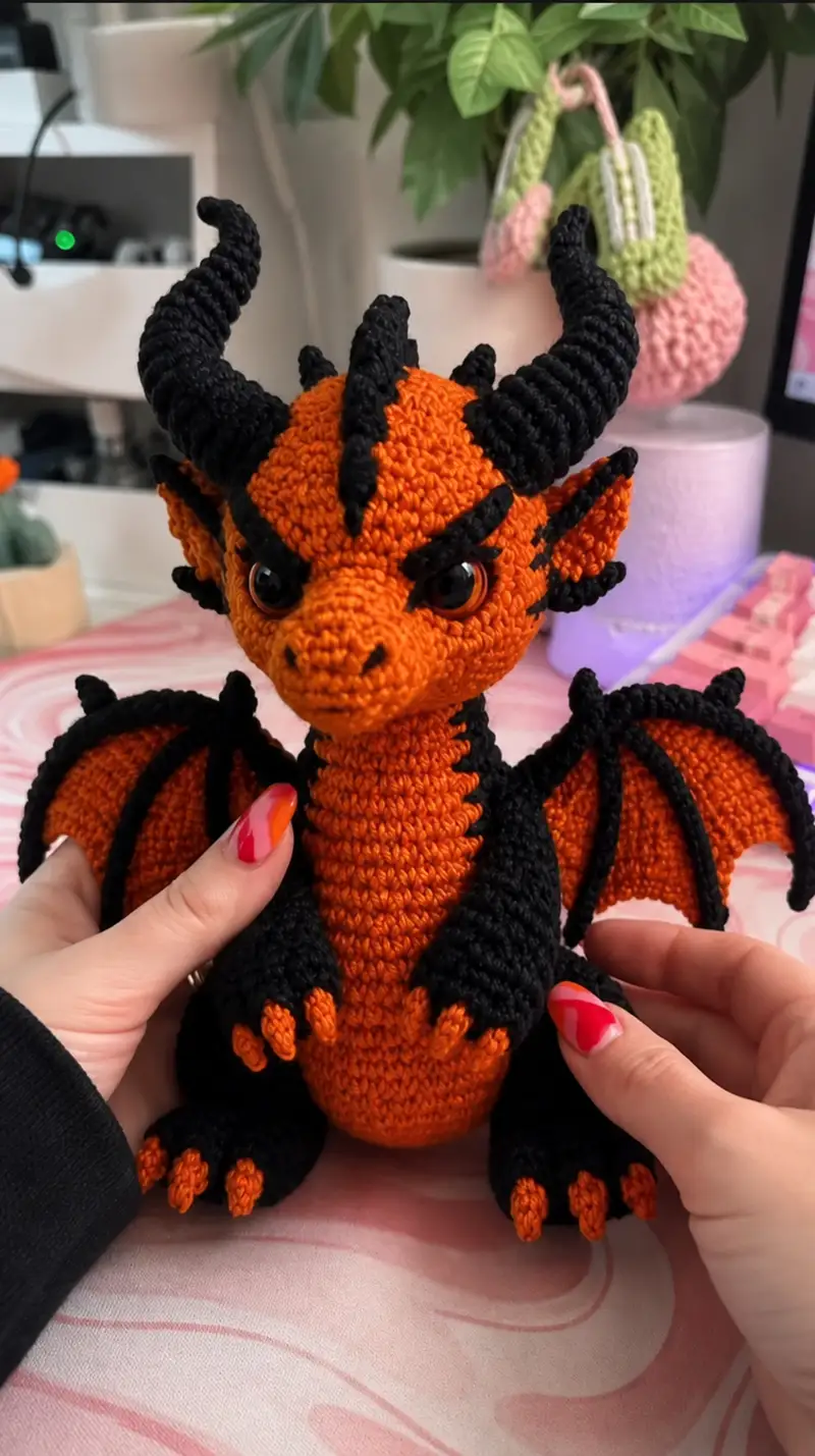 Fiery Orange and Black Dragon Amigurumi Pattern crochet pattern - detailed view of completed project
