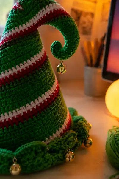 Big Green Spiral Elf Hat with Jingle Bells and Candy Stripes Pattern step 2 - assembly progress