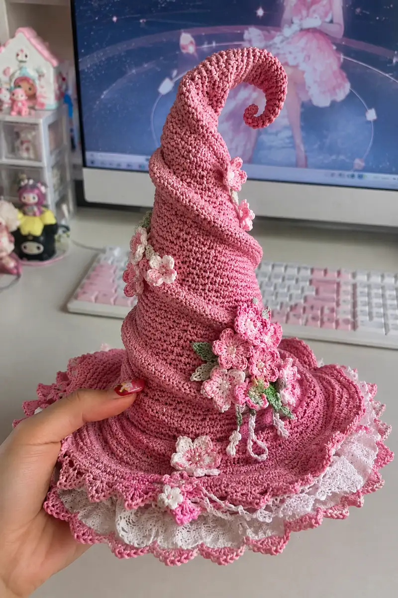 Big Tall Rose Pink Spiral Witch Hat with Cherry Blossoms and Lace Trim Pattern crochet pattern - detailed view of completed project