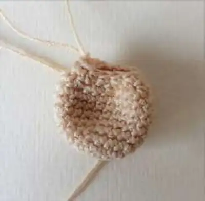 Holly Baby Amigurumi Pattern step 4 - final assembly and finishing
