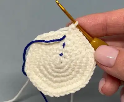Bunny baby rattle with teether ring Amigurumi Pattern step 4 - final assembly and finishing