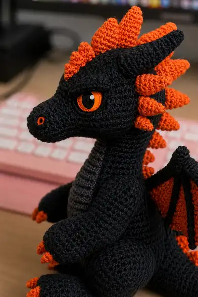 Black Demon Dragon with Orange Flame Spikes Amigurumi Pattern step 2 - assembly progress