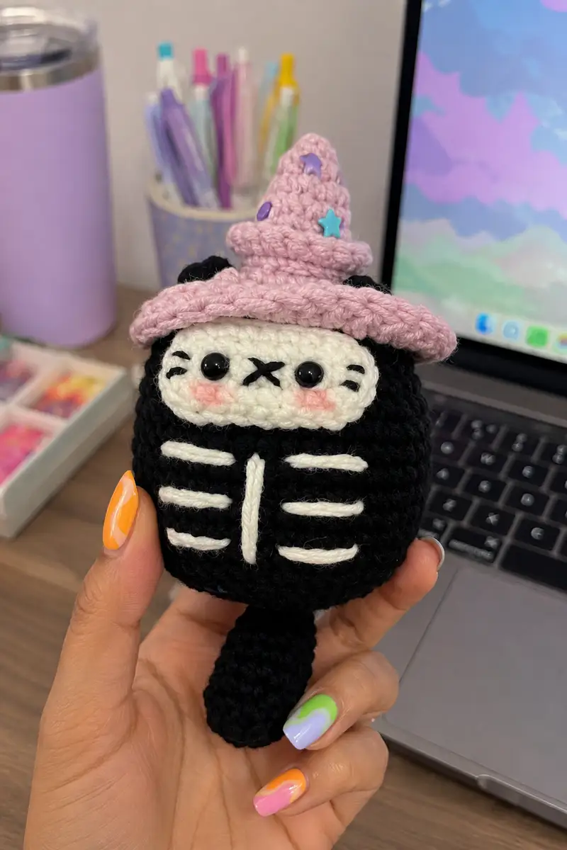 Halloween Cat Skeleton with Witch Hat Amigurumi Pattern crochet pattern - detailed view of completed project
