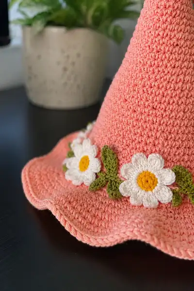 Big Peach Spiral Witch Hat with Daisies and Curled Tip Pattern step 2 - assembly progress
