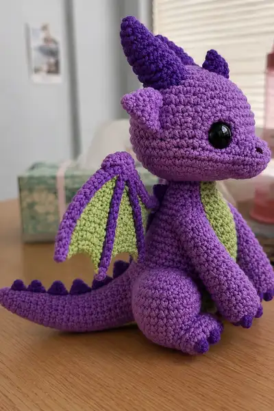 Purple Demon Dragon with Bat Wings and Green Belly Amigurumi Pattern step 2 - assembly progress