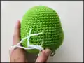 Baby Grinch Amigurumi Pattern step 4 - final assembly and finishing