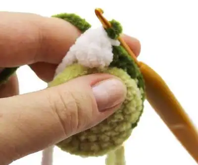 Dino Family Amigurumi Pattern step 4 - final assembly and finishing