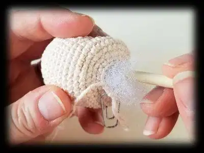 Mini Baby Doll Amigurumi Pattern step 4 - final assembly and finishing