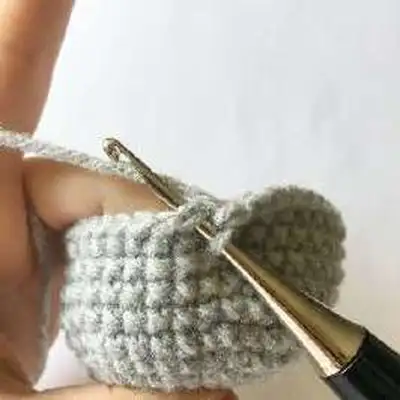 Samantha the Sloth Amigurumi Pattern step 4 - final assembly and finishing