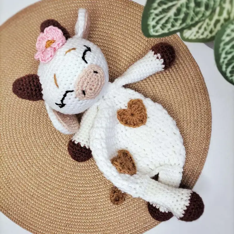 Free Intermediate crochet pattern: Cuddle me cow Amigurumi Pattern - Easy to follow tutorial