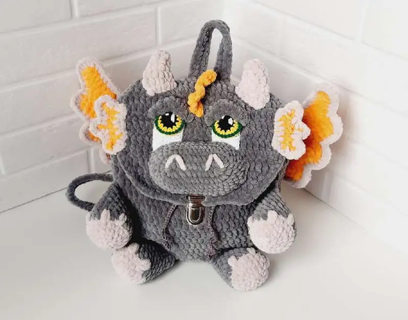 Free Intermediate crochet pattern: Baby Dino Backpack Amigurumi Pattern - Easy to follow tutorial