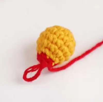 Christmas Hats for Mini Penguins Amigurumi Pattern step 2 - assembly progress