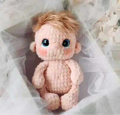 Baby Doll Amigurumi Pattern step 4 - final assembly and finishing