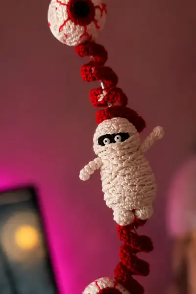 Blood Red Spiral Halloween Garland with Mummies and Bloody Eyes Amigurumi Pattern step 2 - assembly progress