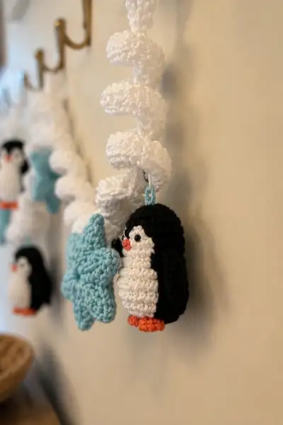 Snowy Spiral Garland with Tiny Penguin and Ice Blue Star Amigurumi Pattern step 2 - assembly progress