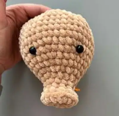 Boar Hand Puppet Amigurumi Pattern step 4 - final assembly and finishing
