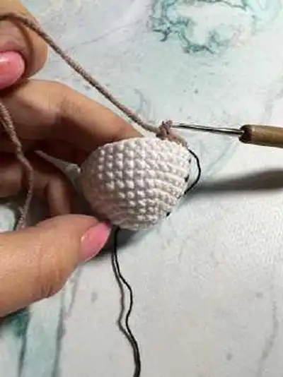 Baby on a Walk Amigurumi Pattern step 2 - assembly progress