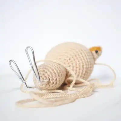 Meowth Amigurumi Pattern step 4 - final assembly and finishing