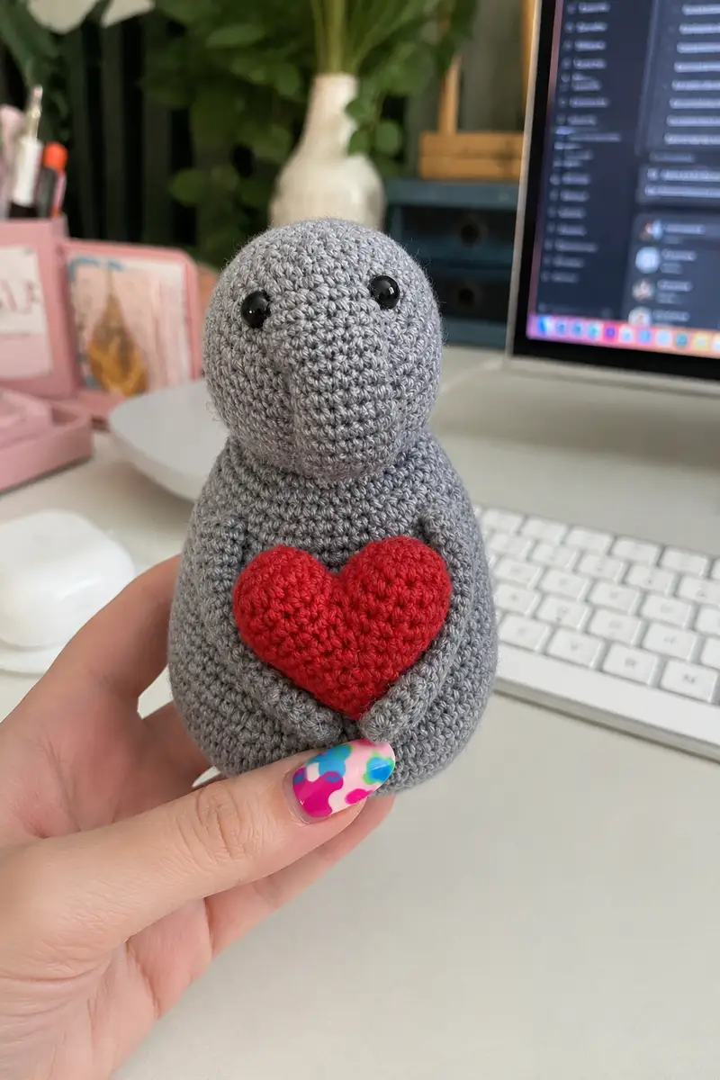 Sweet Little Grey Amigurumi Holding Heart Amigurumi Pattern crochet pattern - detailed view of completed project
