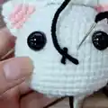 Christmas Giftbox Cat Amigurumi Pattern step 4 - final assembly and finishing