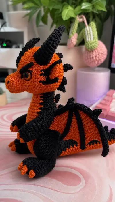 Fiery Orange and Black Dragon Amigurumi Pattern step 2 - assembly progress
